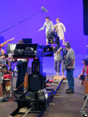 The boys against a blue screen for a flying scene
